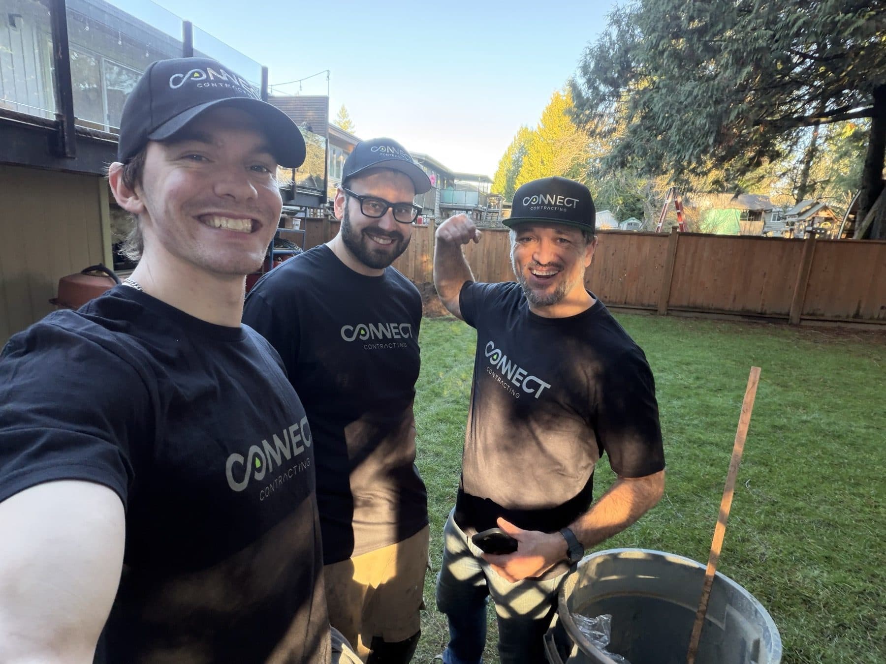The Connect Contracting crew in branded shirts on a job site in Abbotsford BC
